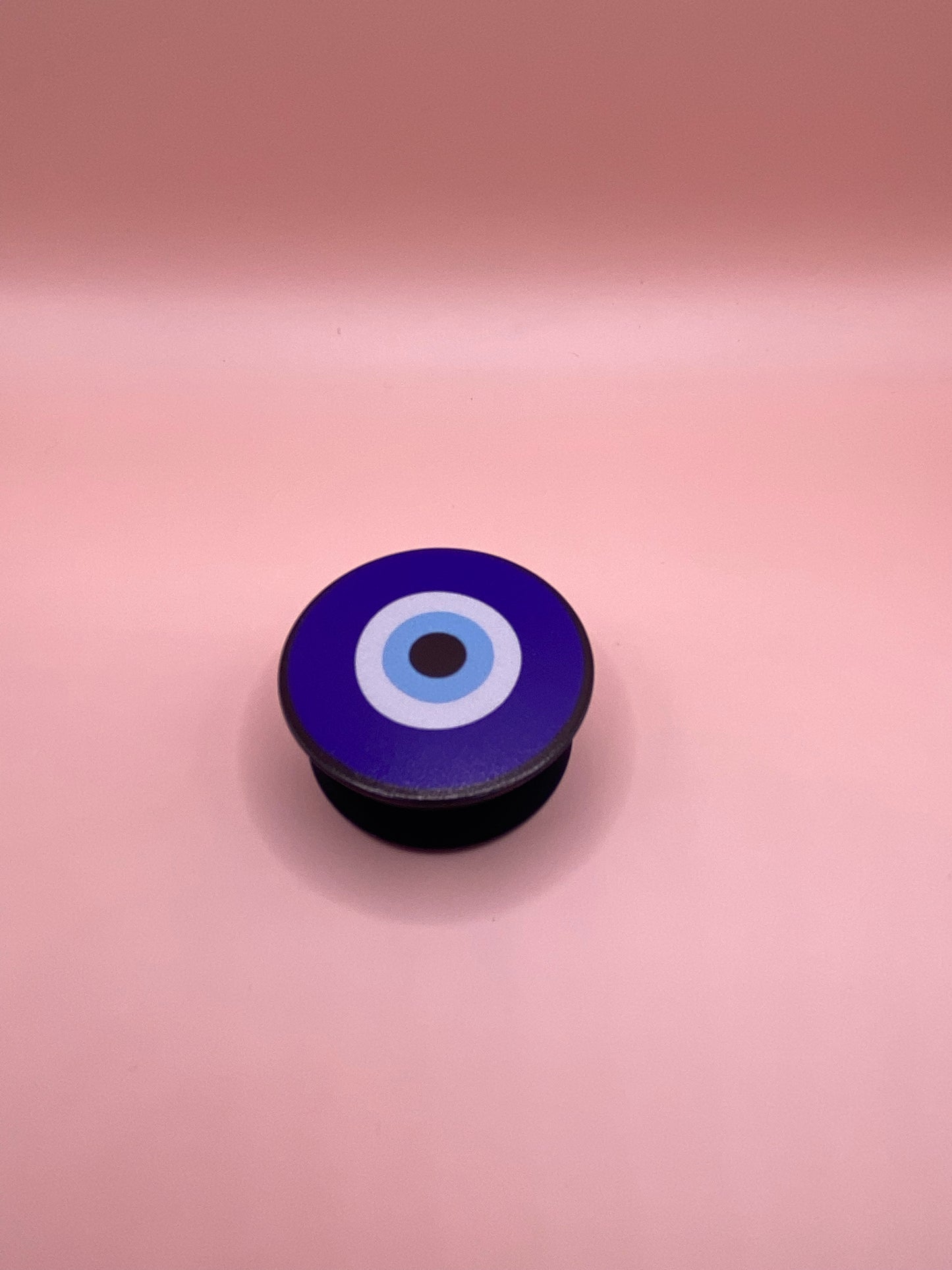 Evil eye pop socket